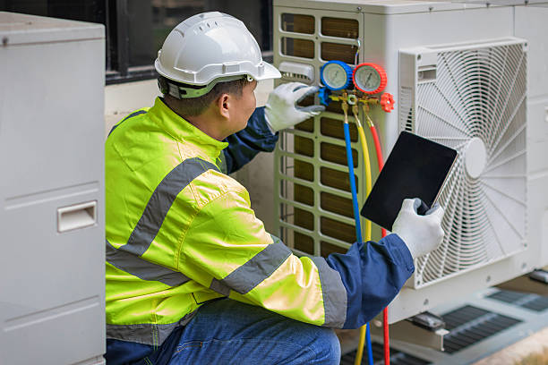 Professional Hvac technician working in Montgomery Village, MD